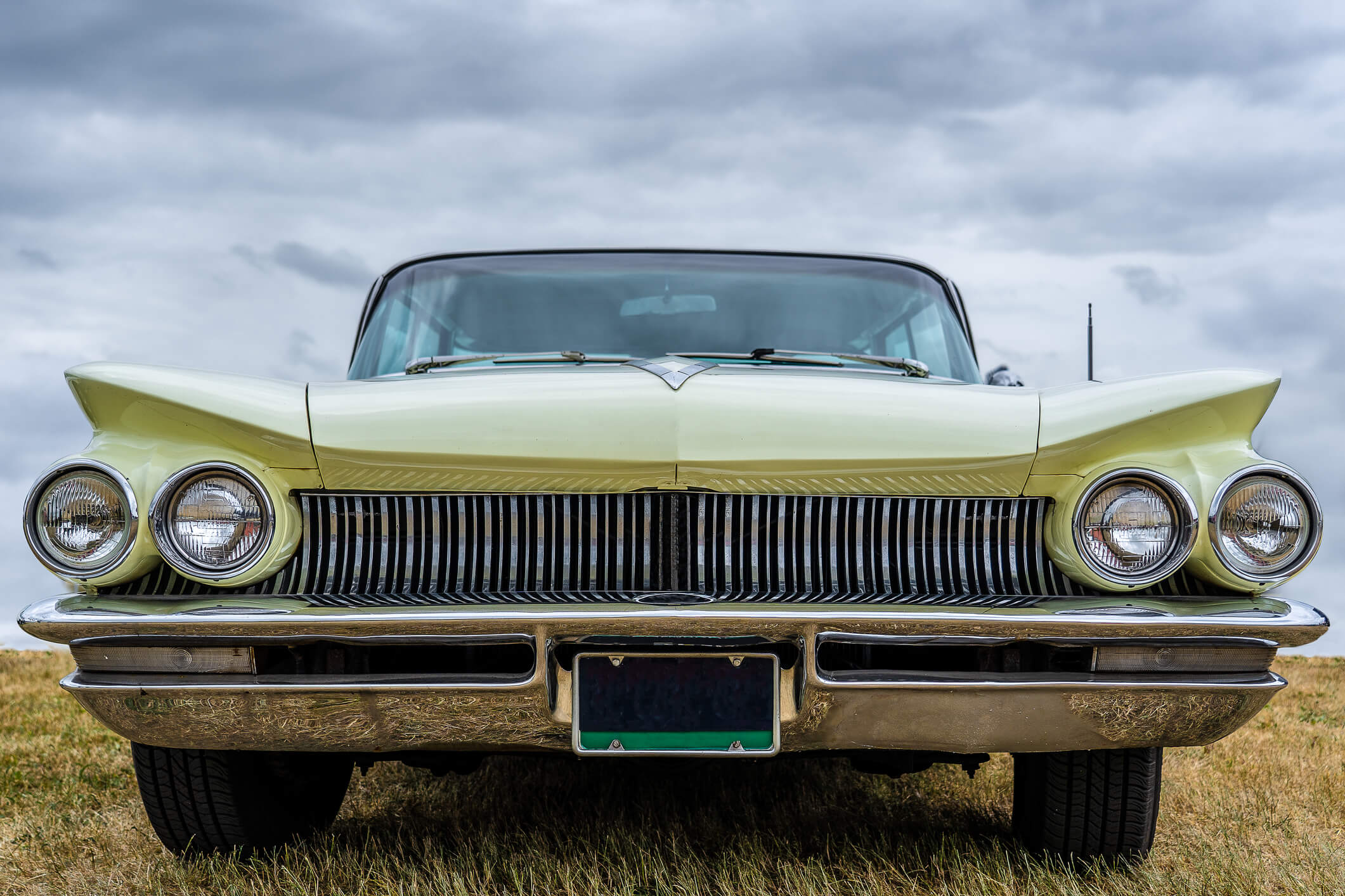 A vintage car under observation in auto detailing training