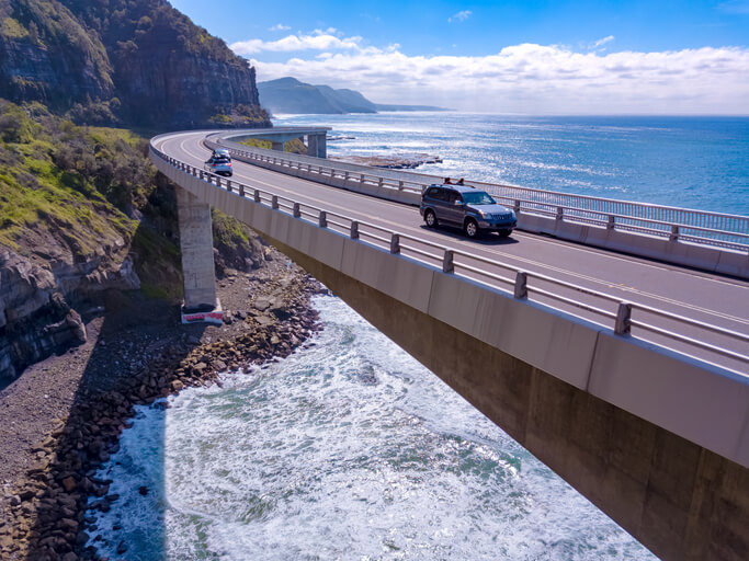 An EV driving over a bridge, to be explored in hybrid and electrical mechanic training