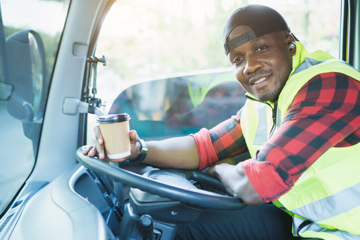 A relaxed male dispatch professional in a truck after dispatch training