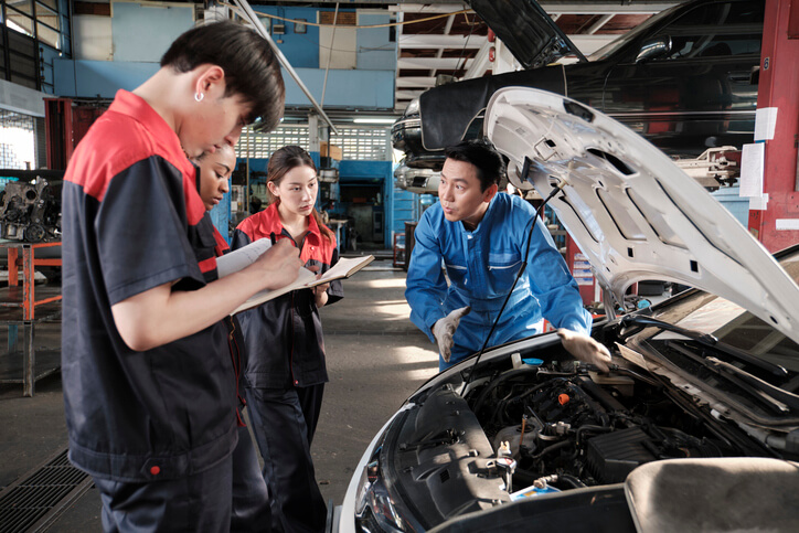 Budding auto mechanics receiving hands-on training at our automotive school