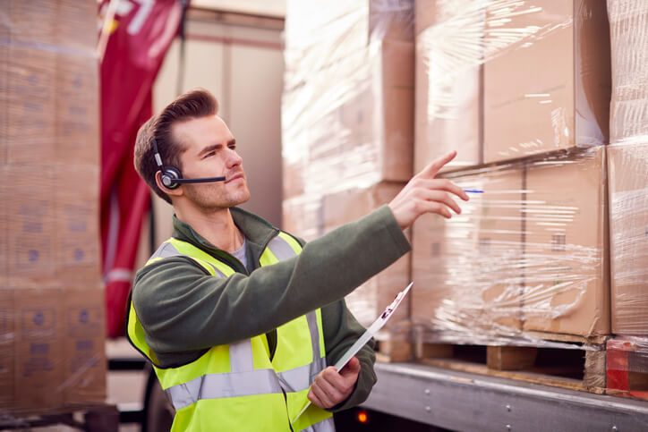 A male operations supervisor at a warehouse after completing his dispatch training