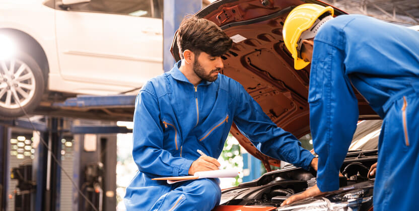 A budding automotive professional receiving hands-on auto parts training