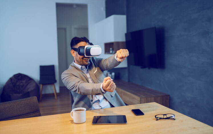 A happy customer using VR tools to test drive a car, to be explored in automotive training