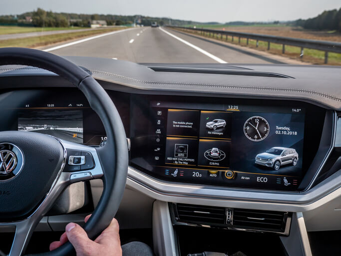 A modern car dashboard illustrating advanced user interface design to be explored in automotive technology training.