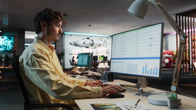 A male dispatcher preparing budgets after dispatch training