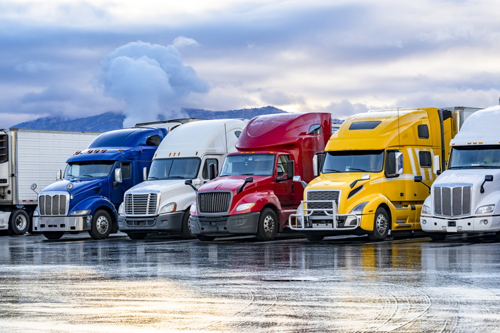 A fleet of trucks ready for dispatch with optimized load plans